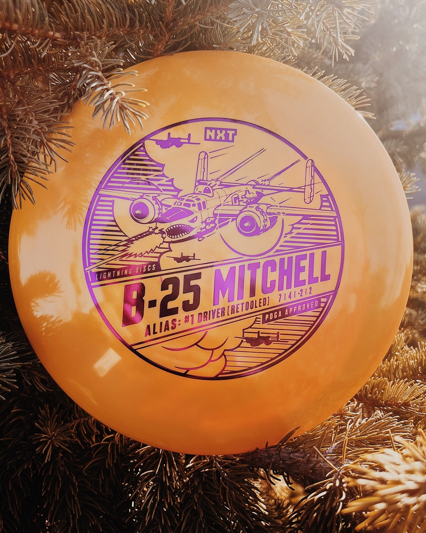 Lightning Discs #1 Driver, B-25 Mitchell edition in NXT plastic, a classic high-glide distance driver with a slightly domey profile and vintage-inspired stamp.