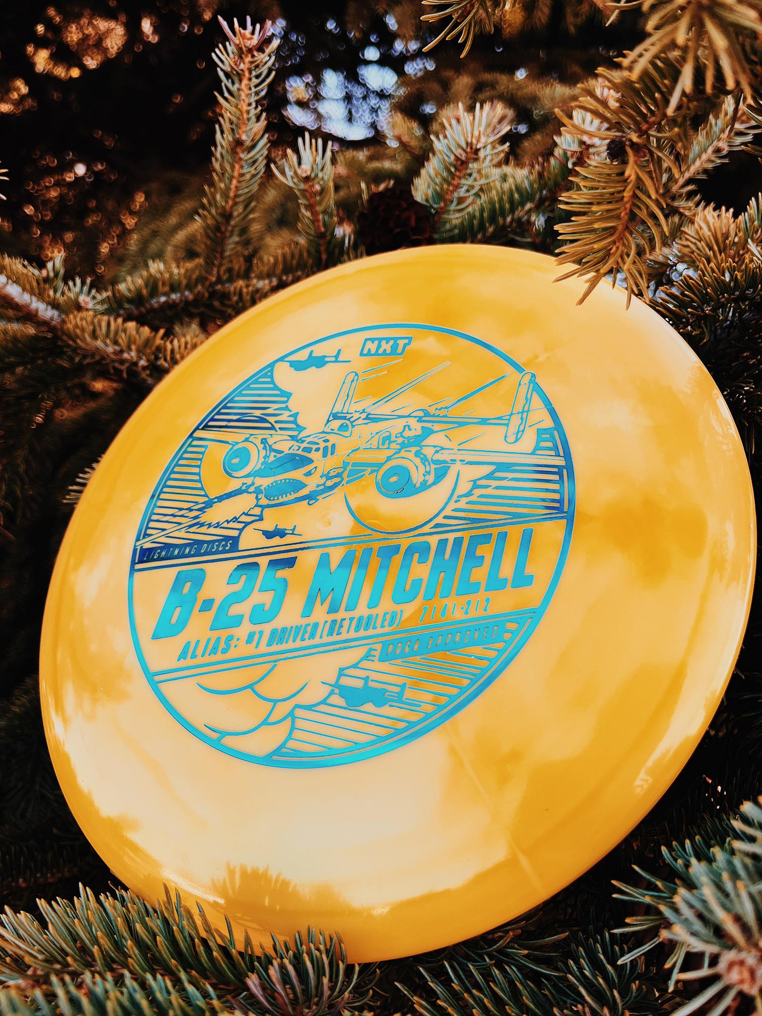 Lightning Discs #1 Driver, B-25 Mitchell edition in NXT plastic, a classic high-glide distance driver with a slightly domey profile and vintage-inspired stamp.