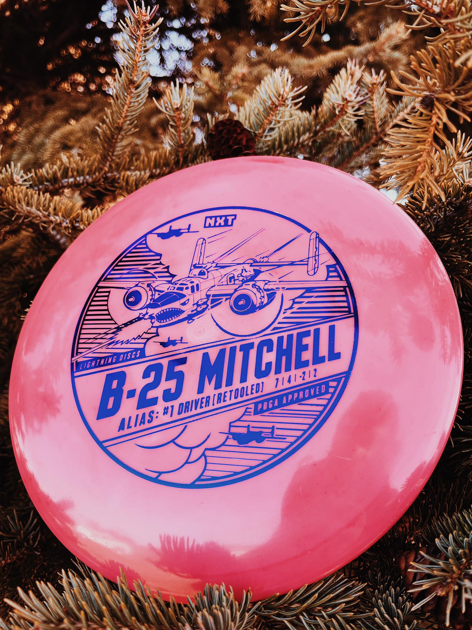 B-25 Mitchell #1 Driver by Lightning Discs in durable NXT plastic, offering maximum glide and a controllable flight path, ideal for long straight drives with a touch of turn.
