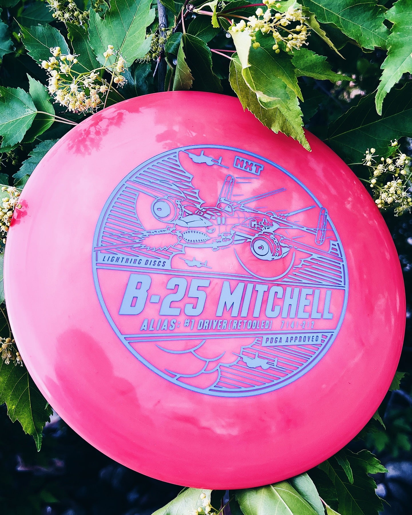 B-25 Mitchell #1 Driver by Lightning Discs in durable NXT plastic, offering maximum glide and a controllable flight path, ideal for long straight drives with a touch of turn.