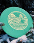 Lightning Discs #2 Hookshot in Sure Grip plastic, an overstable midrange disc with a pronounced rim and classic stamp, designed for reliable fade and strong headwind performance.