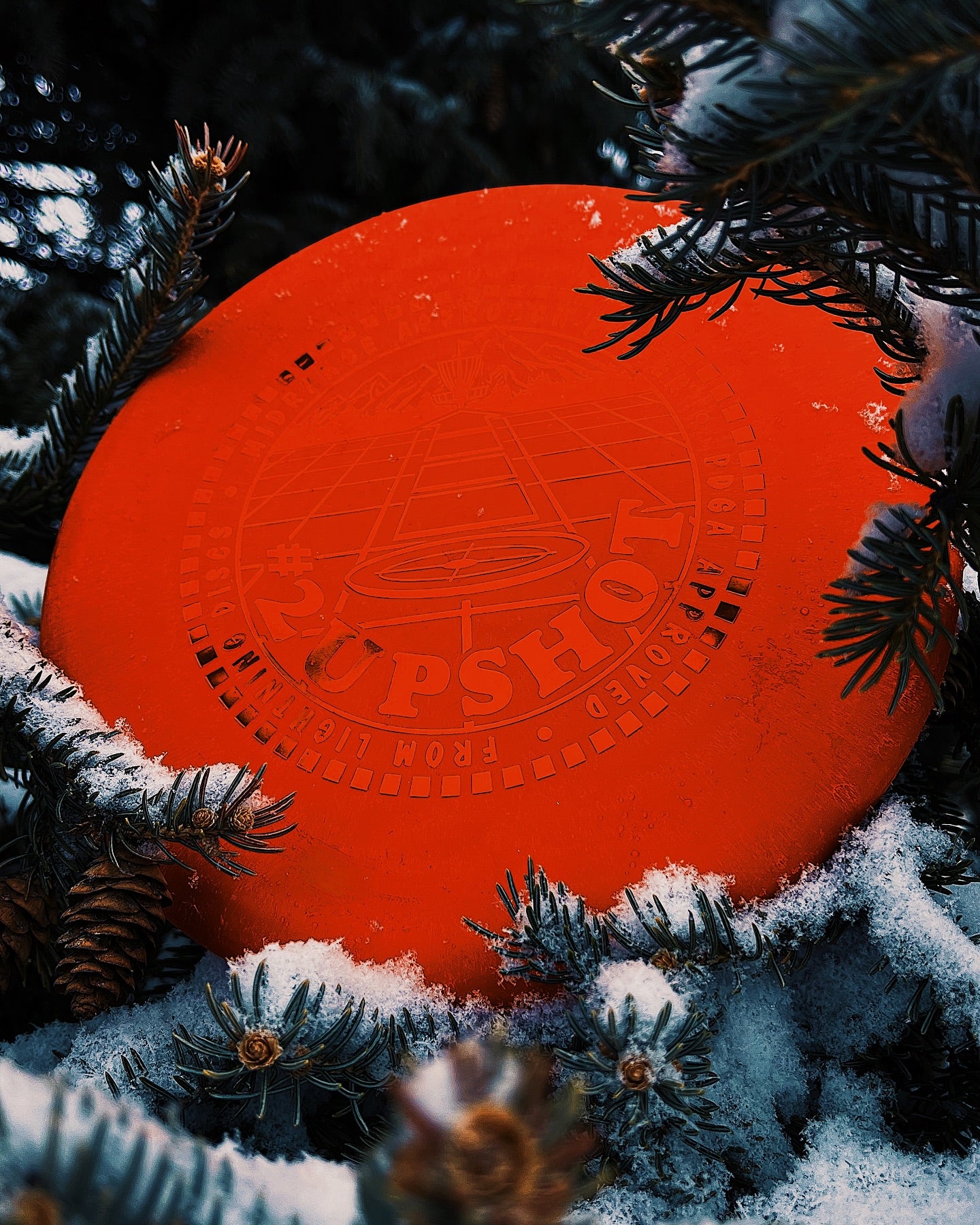 #2 Upshot by Lightning Discs in premium plastic, offering a straight flight with minimal fade, ideal for accurate midrange throws and tight fairway lines.