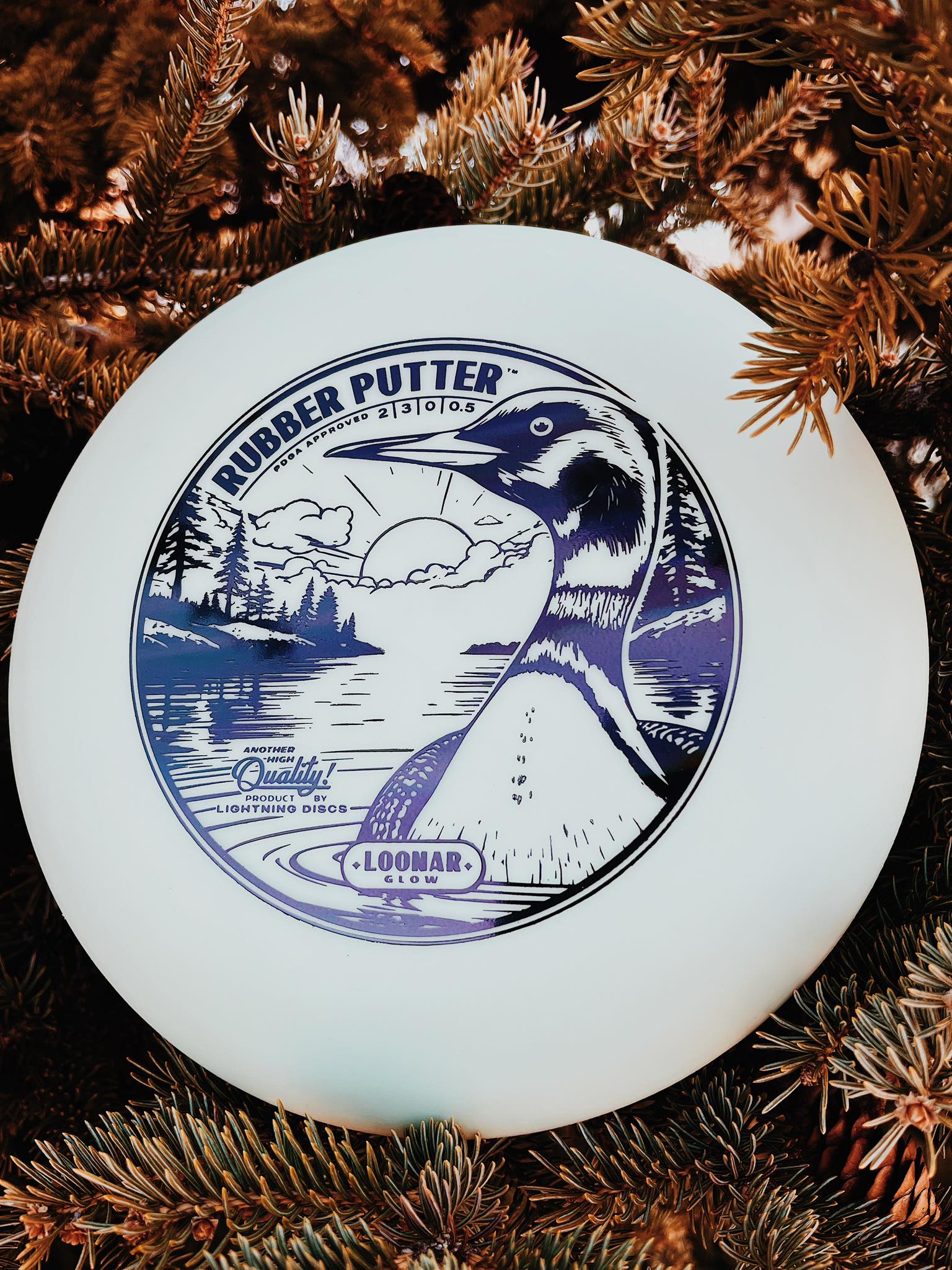 Lightning Discs Loonar Glow Rubber Putter, a wind-resistant, highly durable putter that floats on water and glows brightly for night rounds.