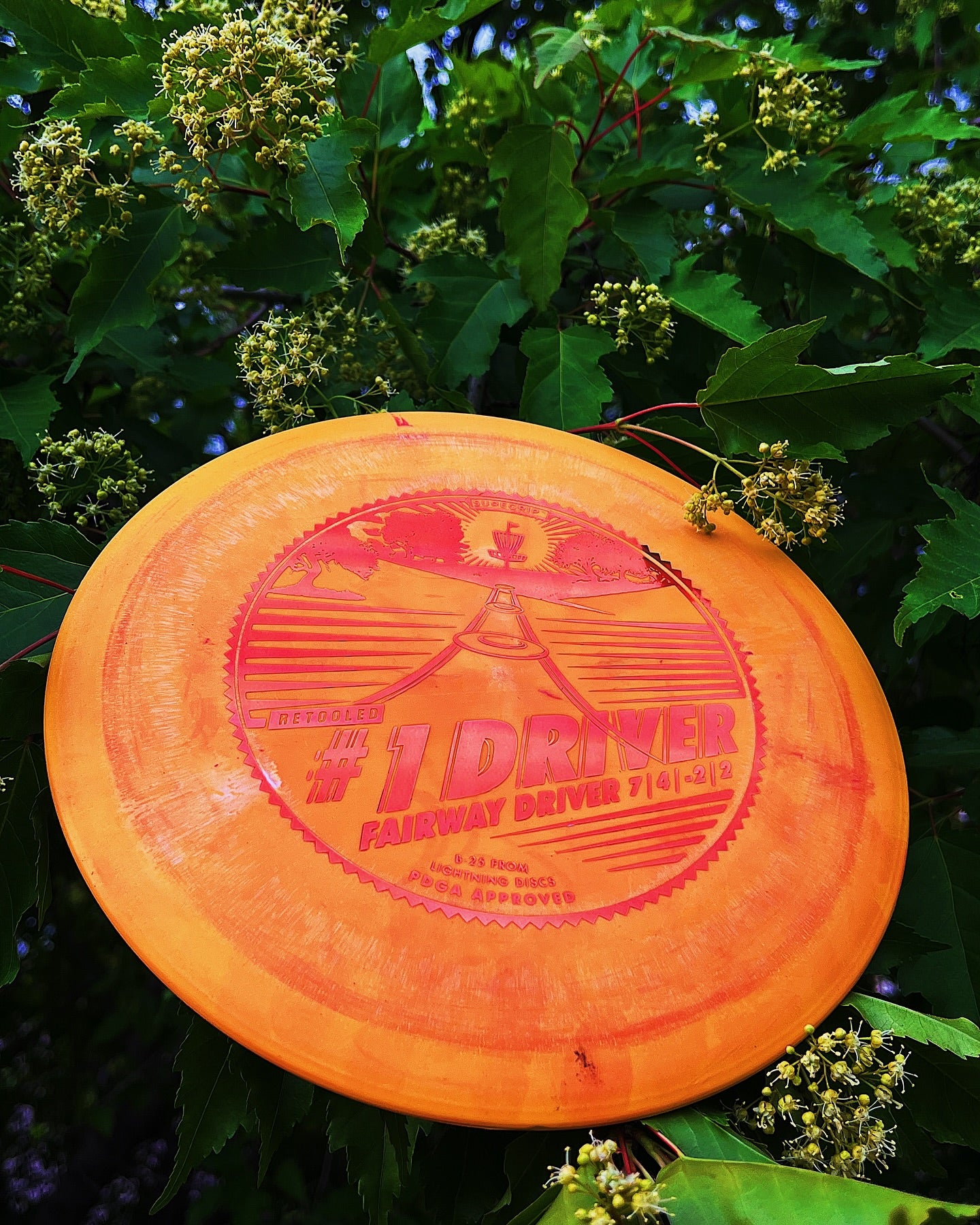 Lightning Discs Sure Grip #1 Driver, shown in premium plastic with a smooth finish and vintage-style stamp, ideal for players seeking maximum glide and straight, controllable flights.
