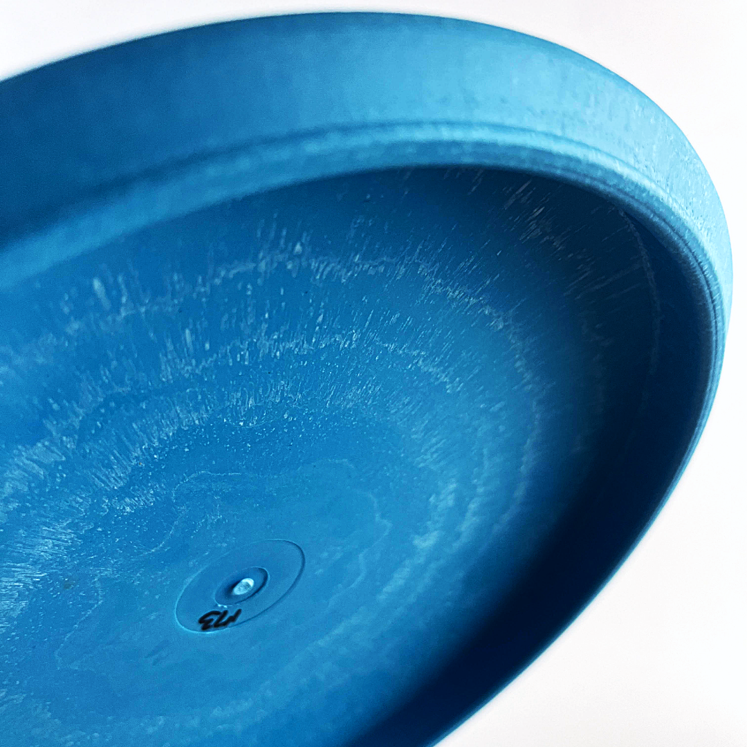 Lightning Discs Sure Grip Rubber Putter, a soft, flexible putter with a rounded edge and tacky rubber blend, designed for confident grip and straight, consistent putts.